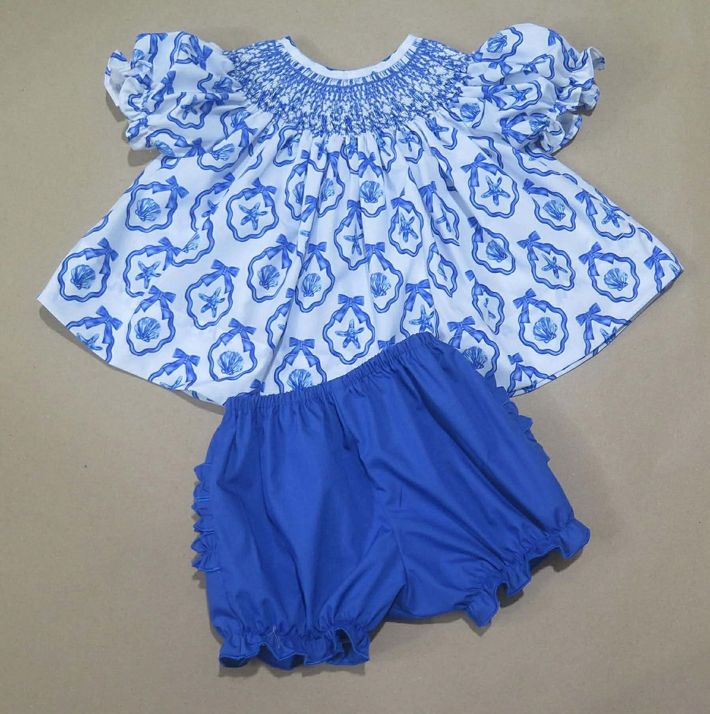 Blue Seashell Smock ETA MAY